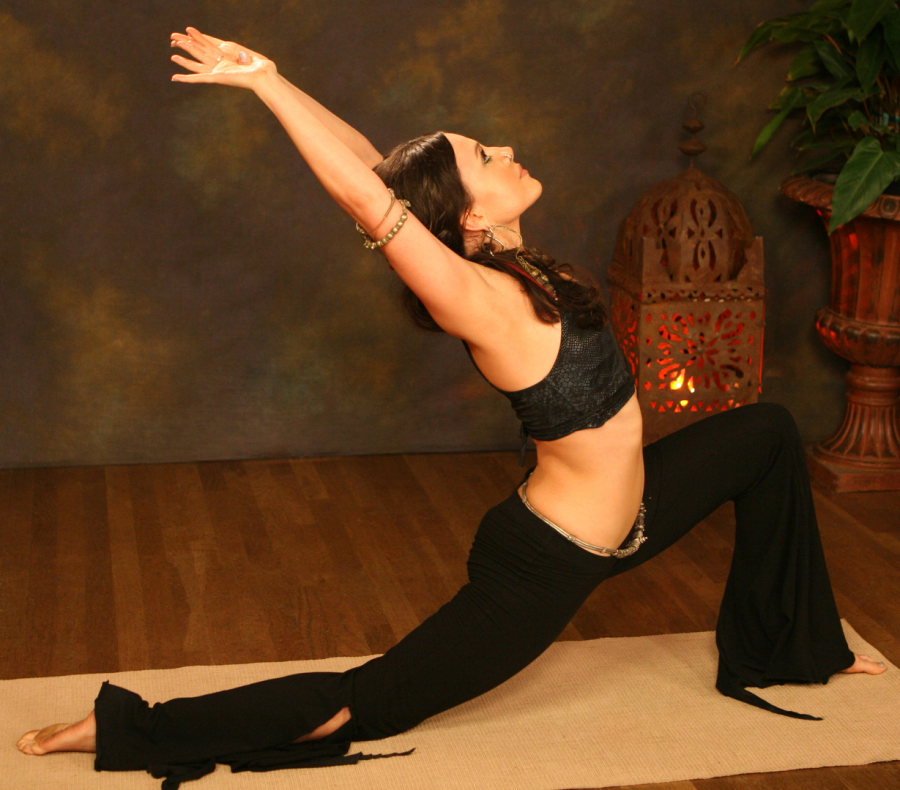Free Photos - A Woman In A Stylish Orange Dress, Seemingly Floating As She  Poses For The Picture. She Appears To Be Wearing A Belly Dance Outfit And  Is The Only Person